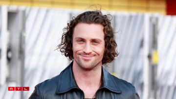 Den Aaron Taylor-Johnson kéint nach dës Woch ënnerschreiwen. (Michael Tran/AFP)