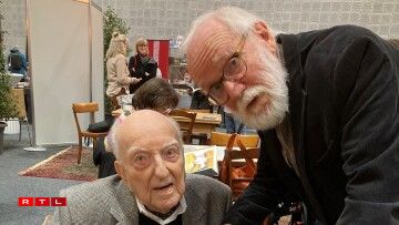 De Pe'l Schlechter (102 Joer) mat sengem Jong Pit Schlechter, den och Schrëftsteller ass