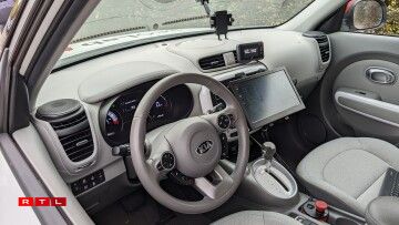 At the front of the vehicle, the driving position is equipped with the University's research instruments.