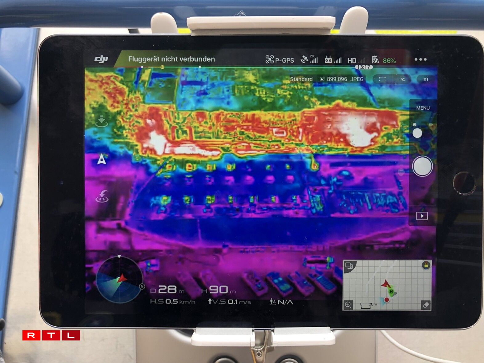 The CGDIS drone shows two concentrated fire spots within the site.