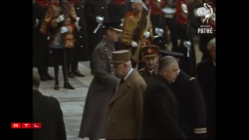 De Gaulle and Jean entering St Paul's Cathedral.