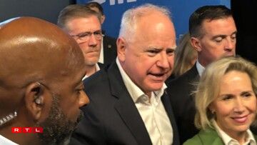 E Méindeg den Owend zu La Crosse: den Tim Walz um Tour.