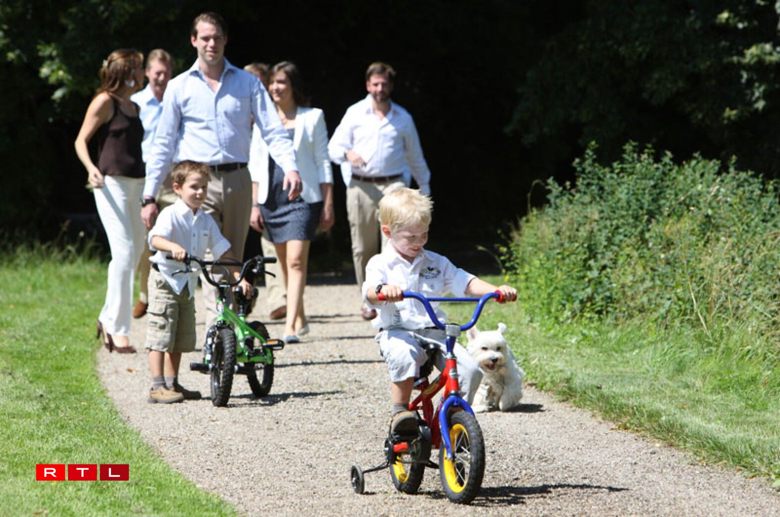 Prince Noah showing off his bicylce riding skills to his older brother Prince Gabriel.