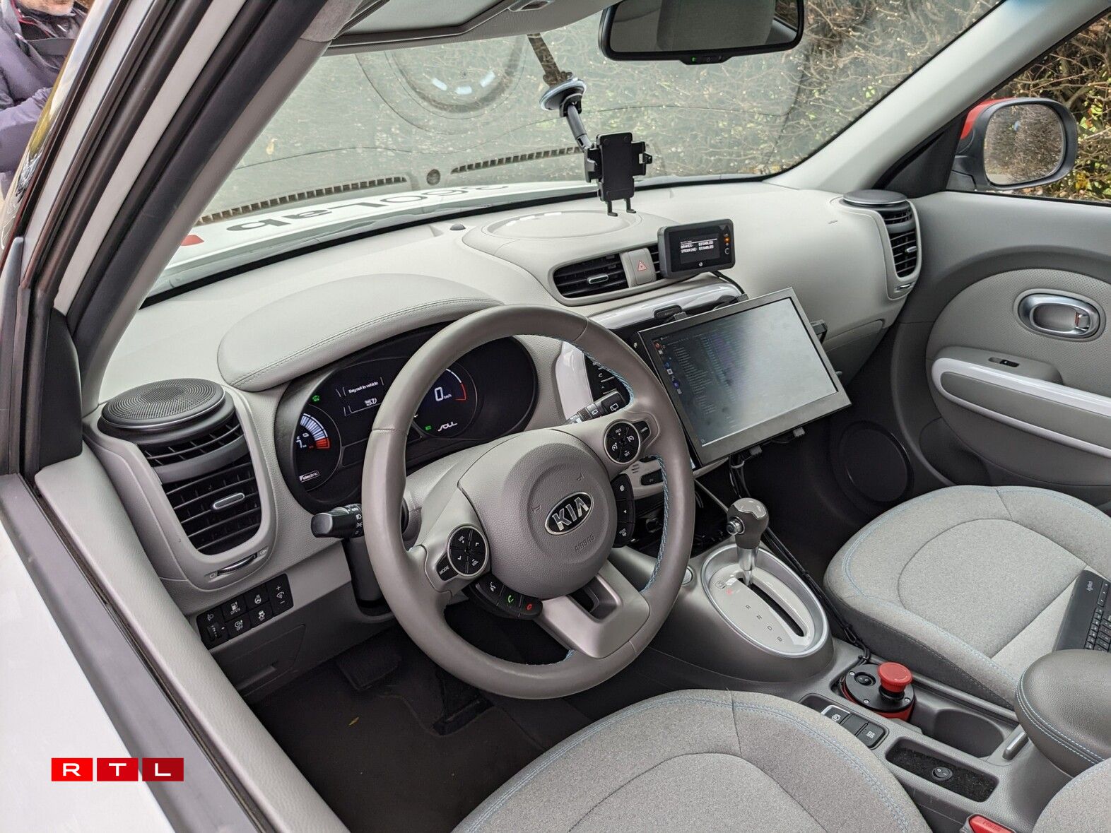 At the front of the vehicle, the driving position is equipped with the University's research instruments.