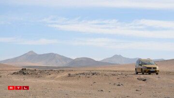 Seraphina, Imani's bright yellow car that is equipped with everything she needs to live comfortably.