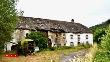 The farmhouse before it partially collapsed.