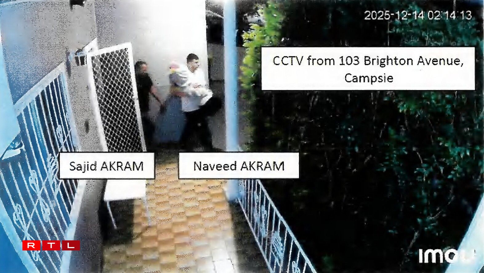 TOPSHOT - This handout photo from a court exhibit released by the NSW Courts as part of the police facts sheet on December 22, 2025 shows a frame grab taken from closed-circuit television camera (CCTV) video footage of Sajid and Naveed Akram allegedly exiting 103 Brighton Avenue in Campsie on December 14, 2025 as they carried items wrapped in blankets.