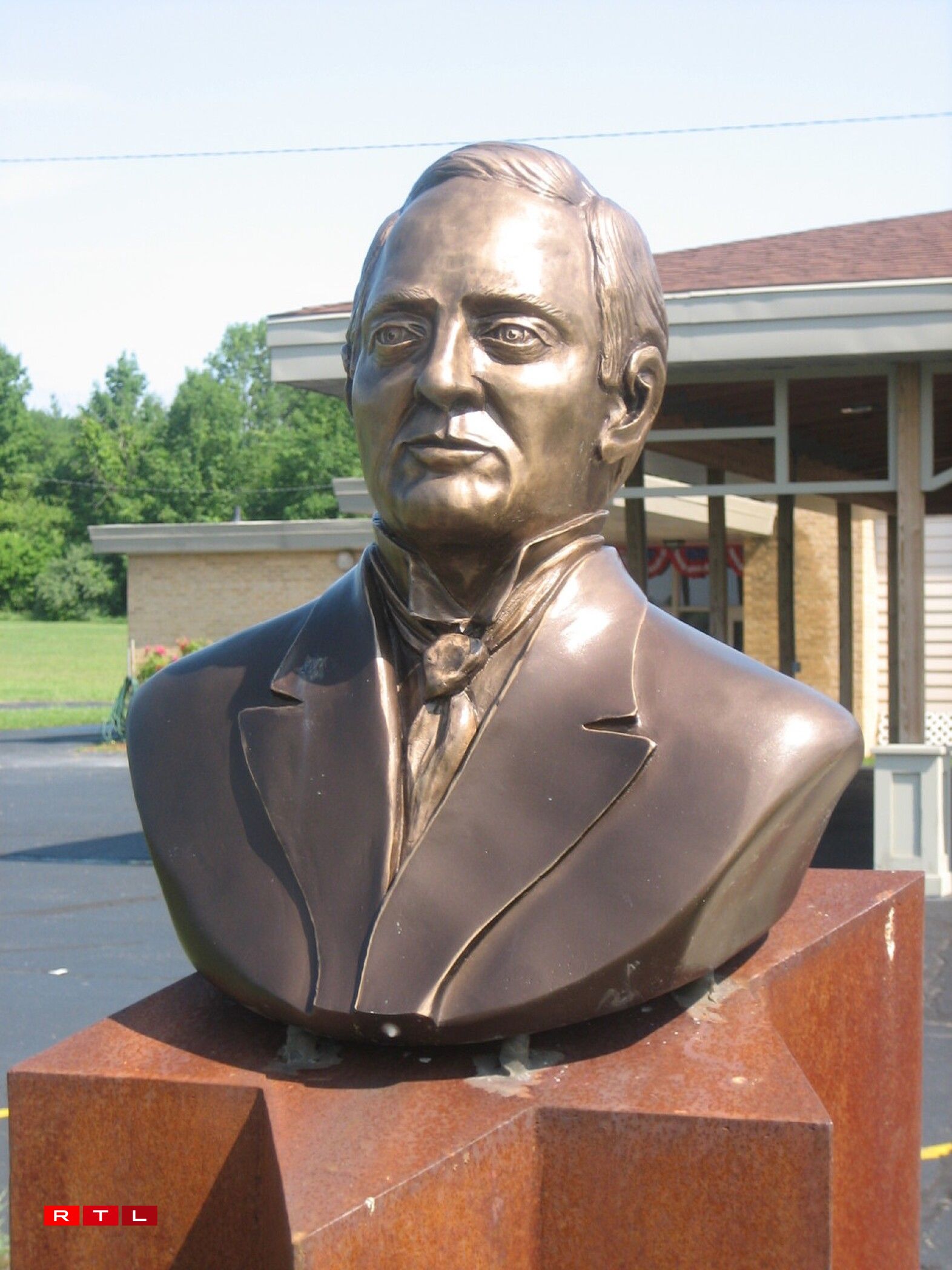 Bronze bust of Dr. Bernard J. Cigrand sculpted by Georges Calteux