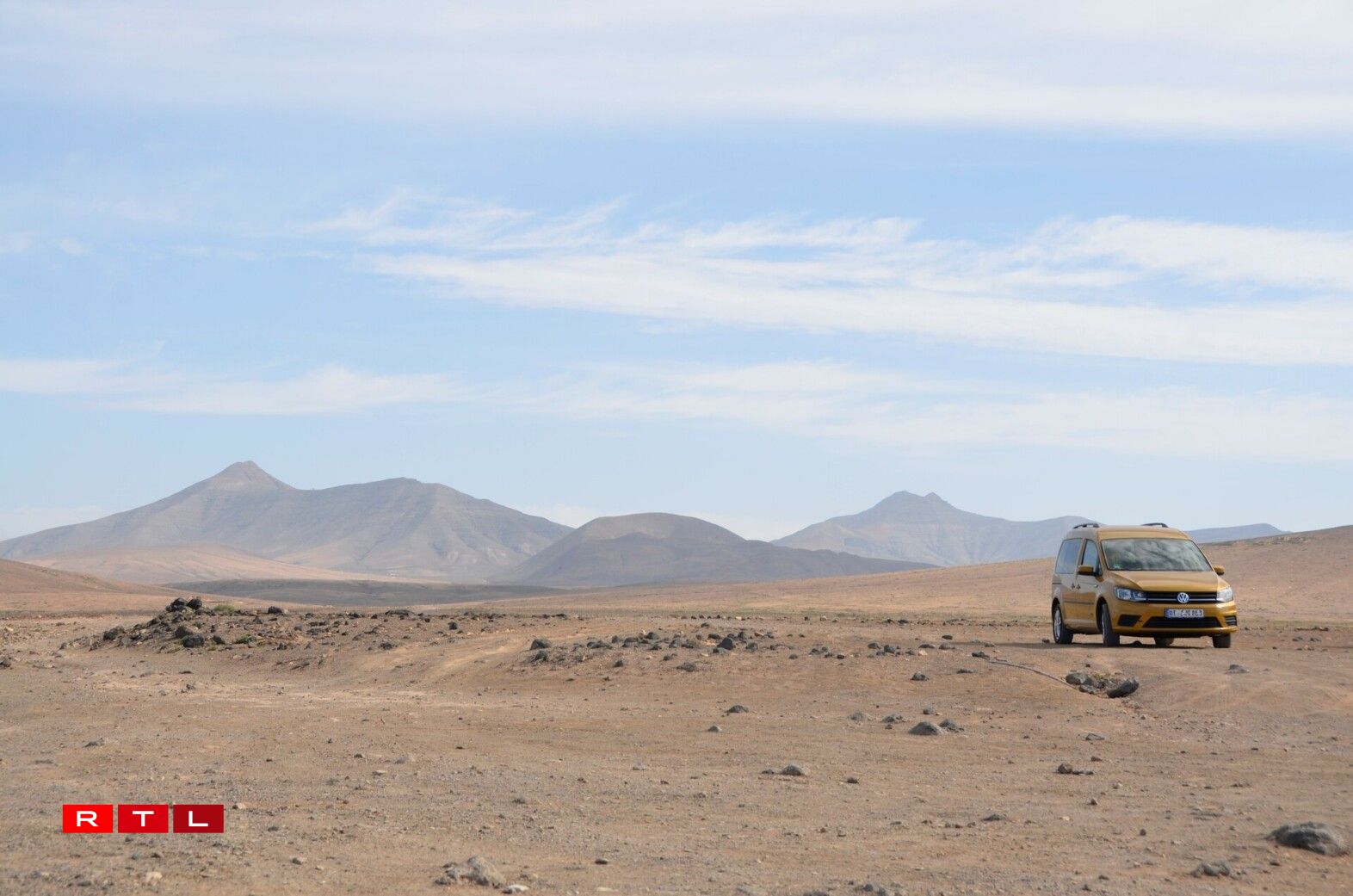Seraphina, Imani's bright yellow car that is equipped with everything she needs to live comfortably.