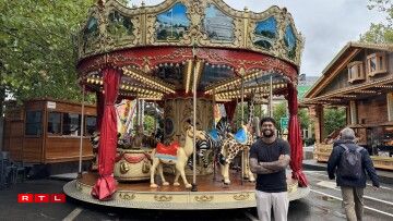 De Kartik Sati virum Karussell op der Fouer dëst Joer