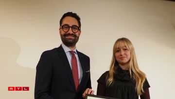 (de g. à dr.) Eric Thill, ministre de la Culture ; Maude Blaschette, autrice