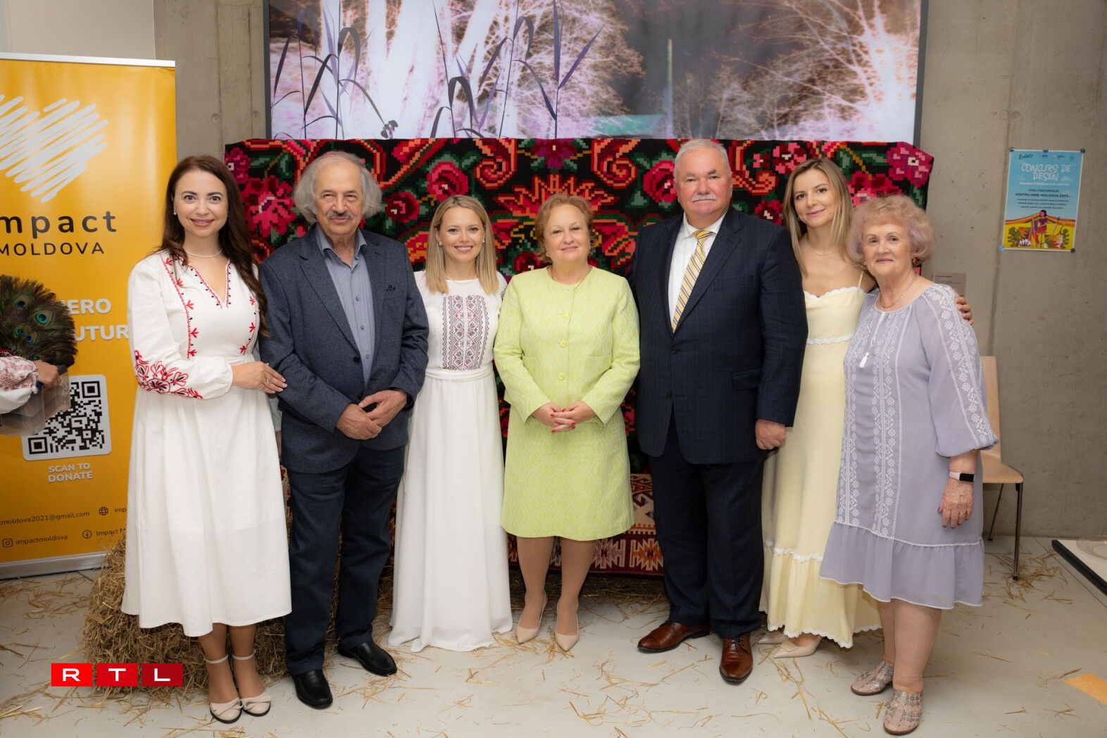 Moldovan poet Vasile Romanciuc with his wife, alongside the Moldovan Ambassador and Impact Moldova team members.