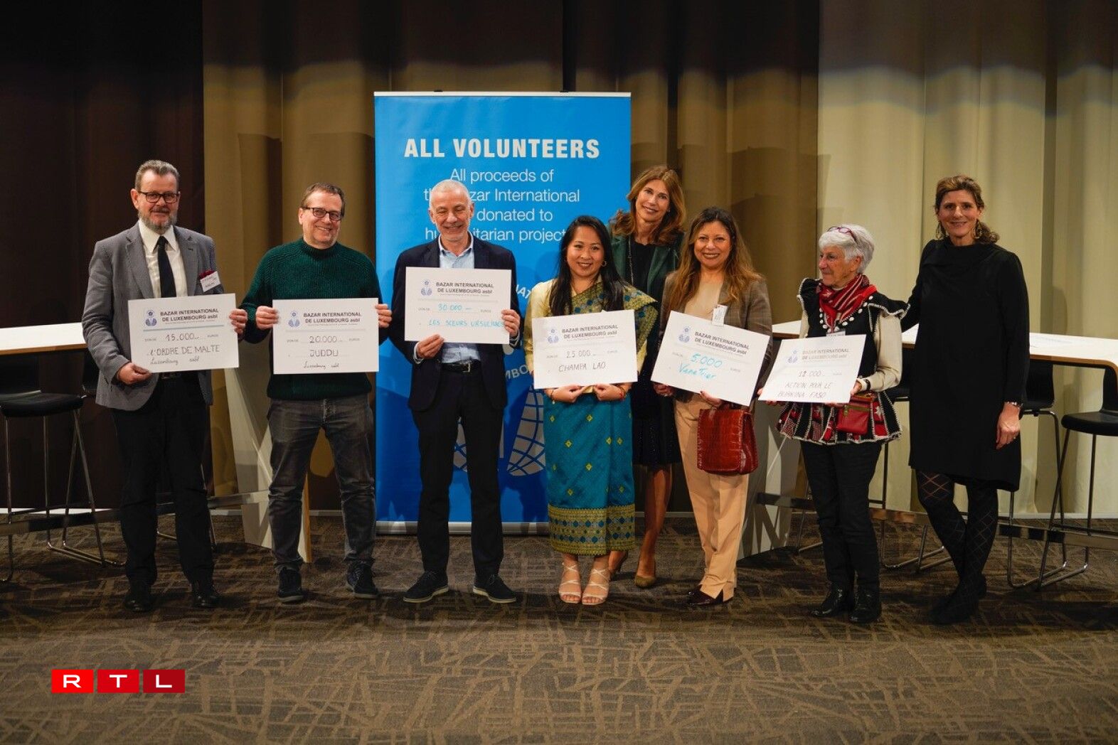 Some of the cheque recipients for the selected charity projects.