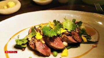 Le filet pur de boeuf à la parilla et ses légumes au wok.