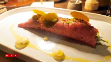 Wagyu beef with Harry's Bar sauce, Parmesan cheese and a sprinkling of rocket, the first dish on the