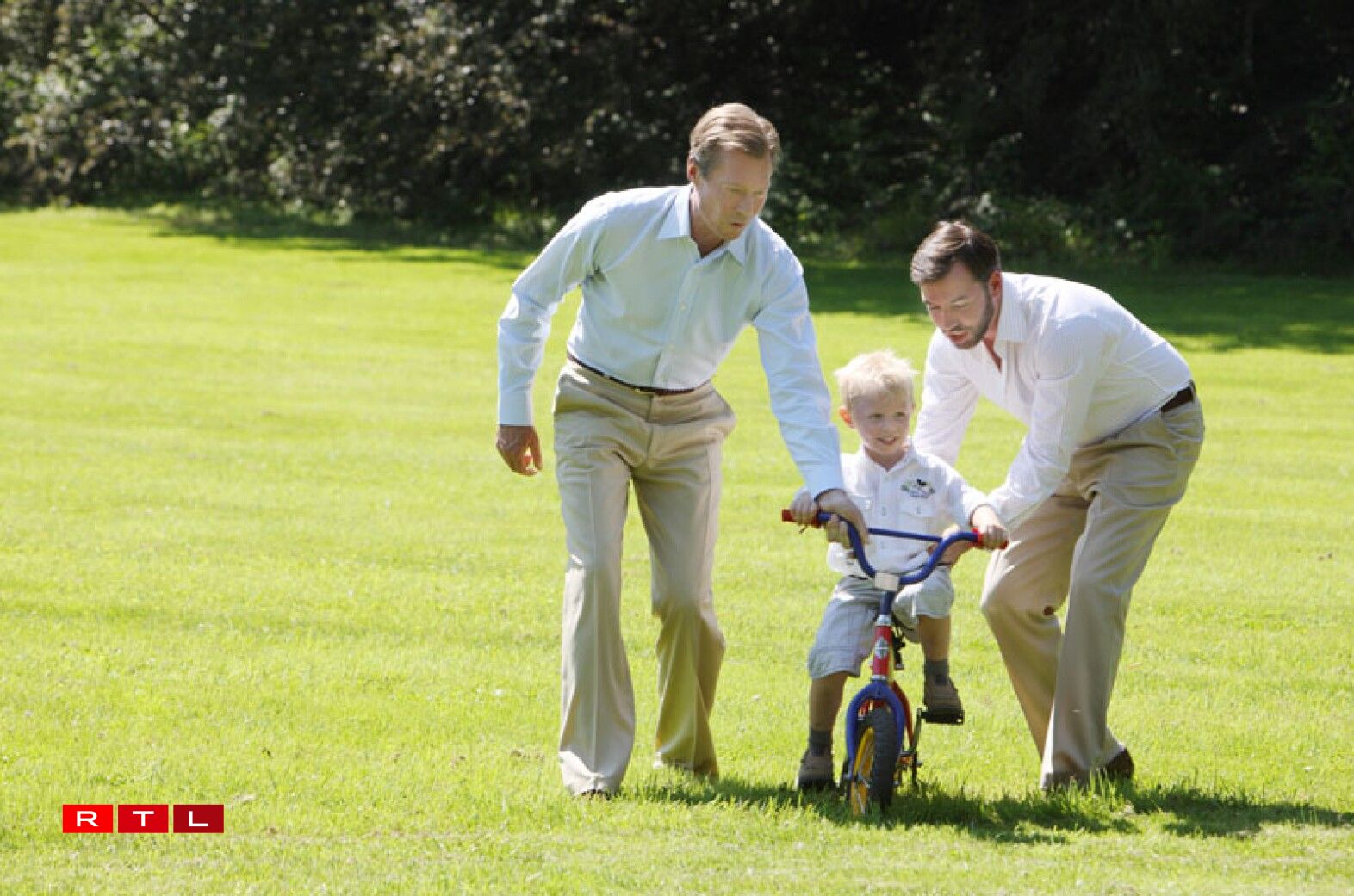 Prince Noah getting a little help from grandfather Grand Duke Henri and uncle, Hereditary Grand Duke Guillaume.
