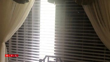 The light through the shuttered up windows.