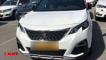 Une voiture photographiée sur le parking de la Belle Etoile le 8 août 2022