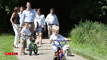 Prince Noah showing off his bicylce riding skills to his older brother Prince Gabriel.