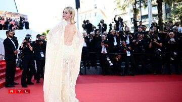 D'US-Schauspillerin Elle Fanning um rouden Teppech.