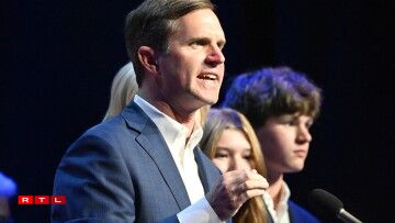 Den Andy Beshear, Gouverneur vu Kentucky.